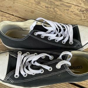 Womens Black Chuck Taylor sneaker, size 10.